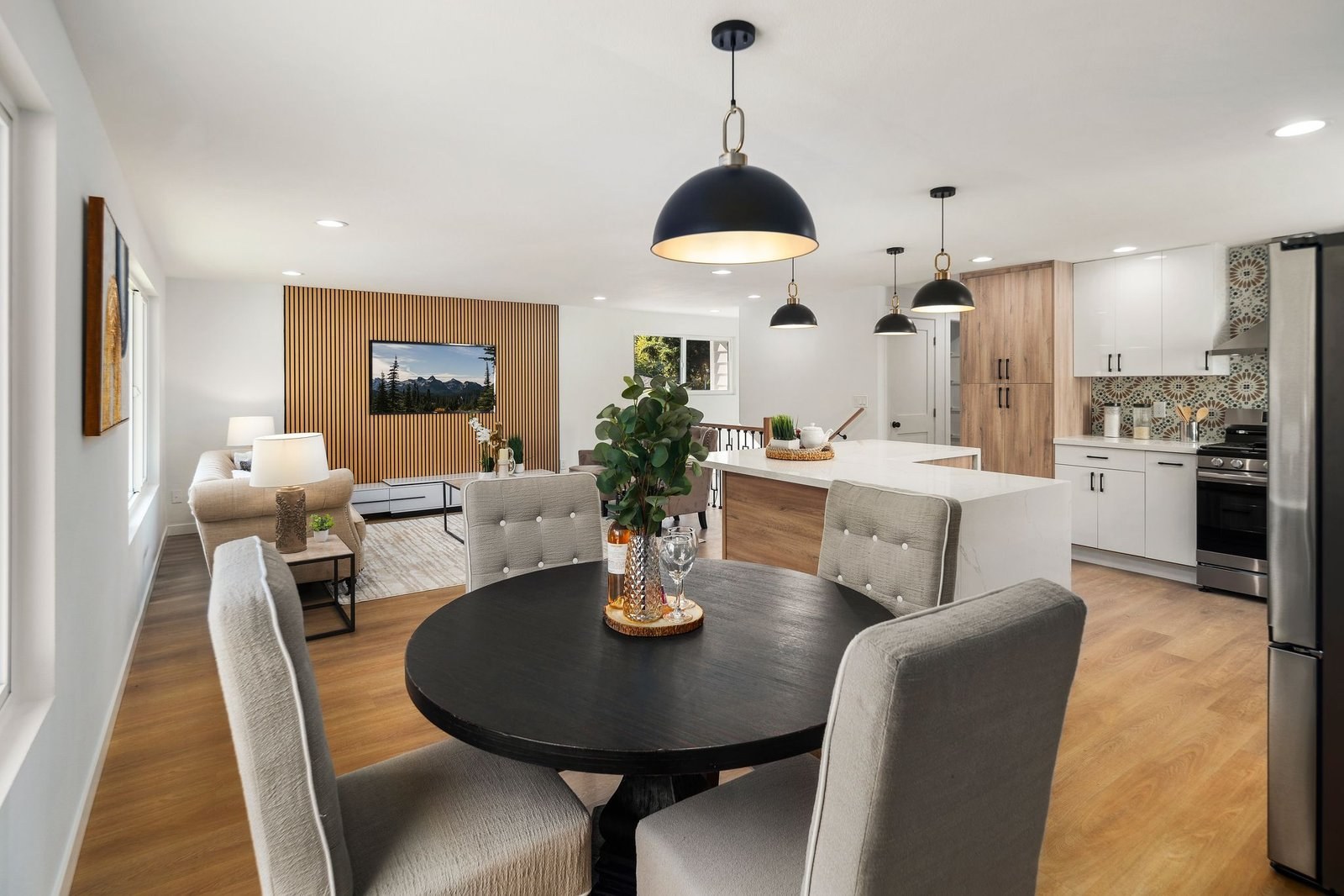 Dining area open to a remodeled kitchen
