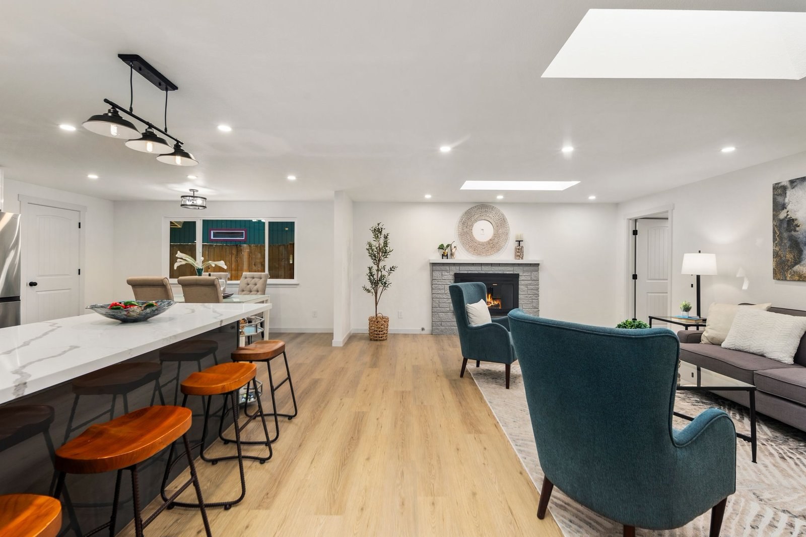 Open plan living and kitchen area after a whole-home remodel