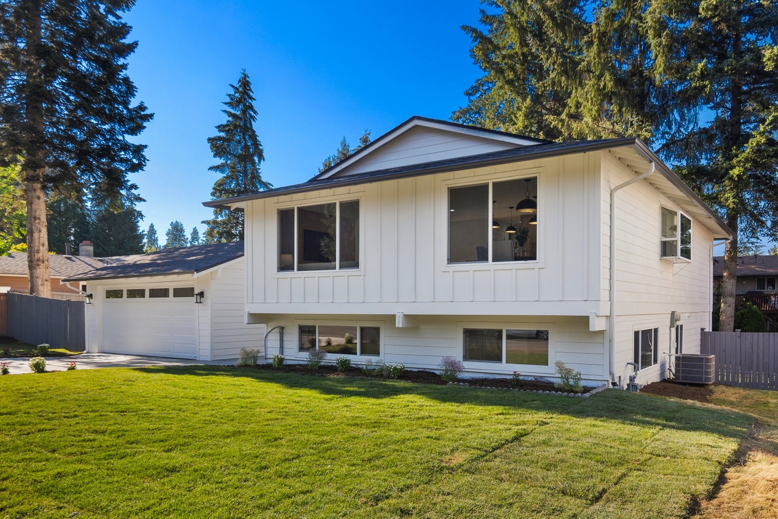 Remodeled split-level home exterior with new siding